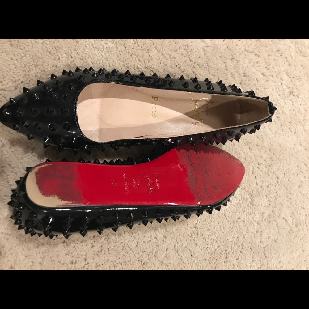 Spiked Christian Louboutin flats